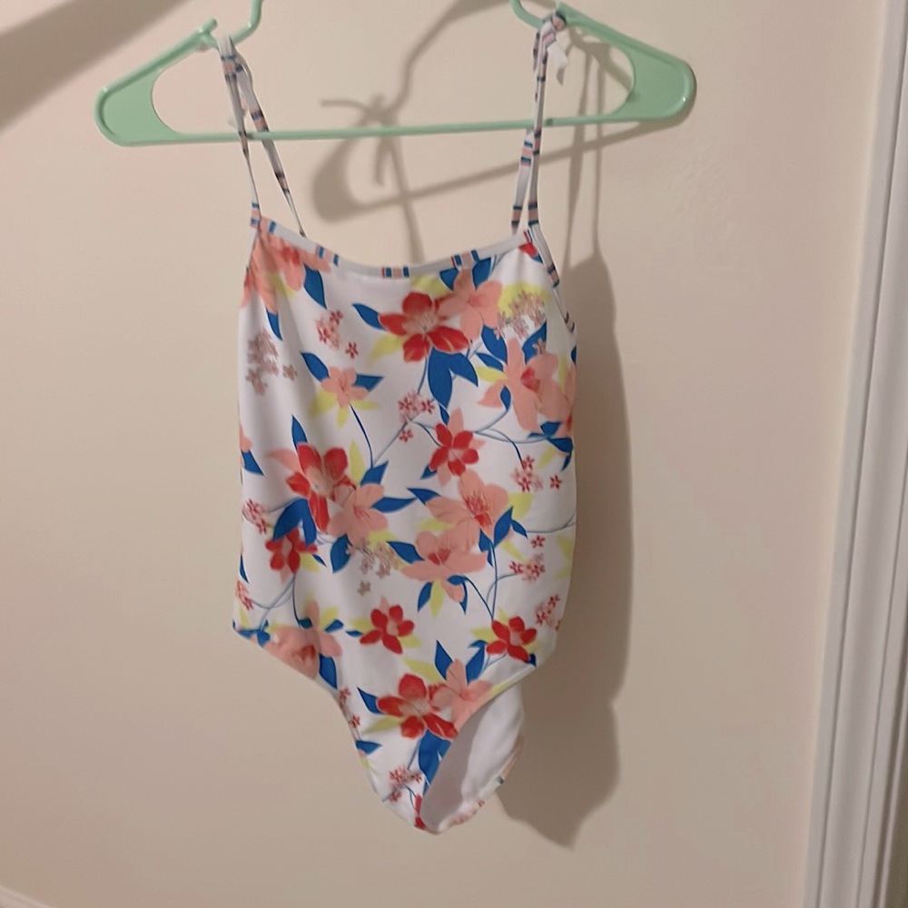 white roxy swimsuit with colorful flowers, size 14.